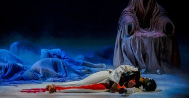 Actors perform during the general rehearsal of Ennio Morricone's only opera, Partenope, at the San Carlo Theatre, Naples, Italy, Dec. 11, 2025. (AP Photo)