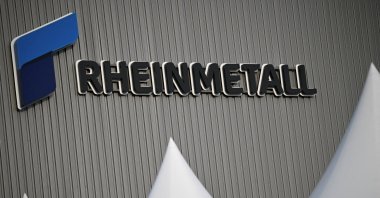 Logo of Rheinmetall, on the day of the inauguration of its new artillery plant, Unterluess, Germany, Aug. 27, 2025. (Reuters Photo)