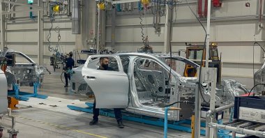 A worker is seen on a car production line, Bursa, northwestern Türkiye, Dec. 9, 2025. (IHA Photo)