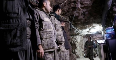 Members of the PKK gather in a cave network in the Qandil mountains, Iraq, Nov. 29, 2025. (AFP Photo)