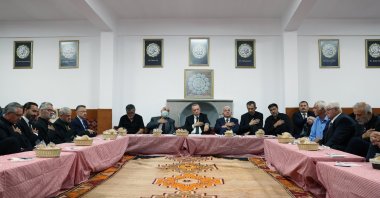 President Recep Tayyip Erdoğan (C) attends a fast-breaking ceremony with the Alevi community at the Hüseyin Gazi Cemevi, Ankara, Türkiye, Aug. 8, 2022. (AA Photo)