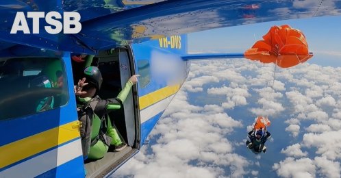 In this image taken from a video a skydiver is caught on the wing of a plane as he exited the aircraft in Tully, North Queensland, Australia, Sept. 20, 2025. (AP Photo)