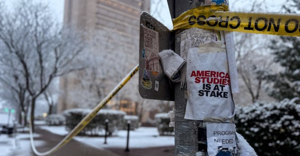 An "American studies is at stake" sign is attached to a pole, at the site of Saturday's mass shooting at Brown University in Providence, Rhode Island, U.S. Dec. 14, 2025. (Reuters Photo)