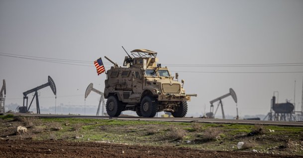 U.S. military vehicle is seen on a patrol in the countryside near the town of Qamishli, Syria, Dec. 4, 2022. (AP Photo)