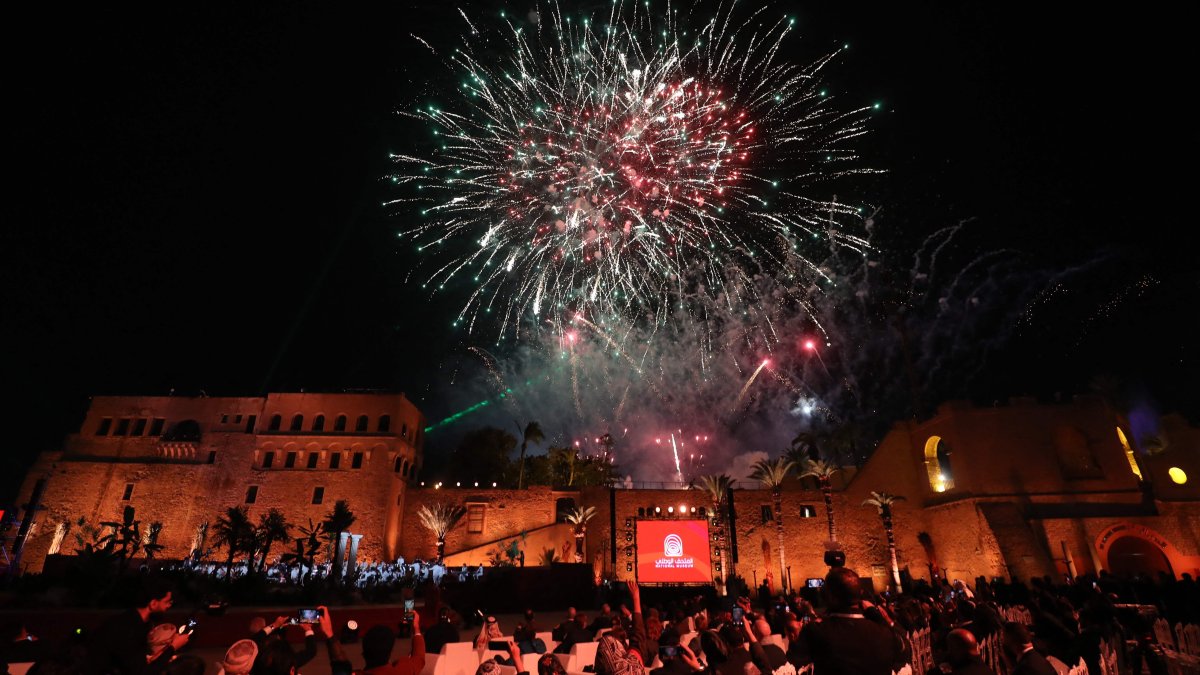 People look on as fireworks light up the sky over the historic Red Castle (As-Saraya al-Hamra) during the reopening ceremony of the National Museum, Tripoli, Libya, Dec. 12, 2025. (AFP Photo)