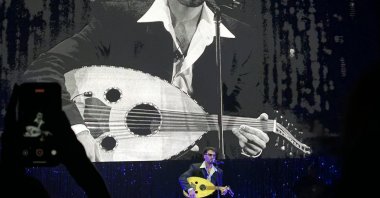 Palestinian singer Saint Levant performs onstage, Istanbul, Türkiye, Dec. 12, 2025. (AA Photo)