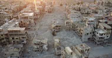 Destroyed residential buildings illustrate the scale of devastation documented in a report by the Human Rights and Equality Institution of Türkiye, Aleppo, Syria, Dec. 15, 2025. (AA Photo)