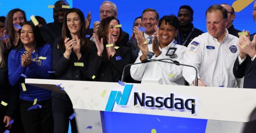Walmart and Sam's Club executives and field associates celebrate the ringing of the opening bell at the Nasdaq Marketsite, in New York City, New York, U.S., Dec. 9, 2025. (AFP Photo)