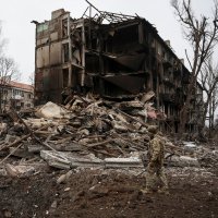 A Ukrainian police officer checks an area for residents in the front line town of Dobropillia, Donetsk region, Ukraine, Dec. 9, 2025. (Reuters Photo)