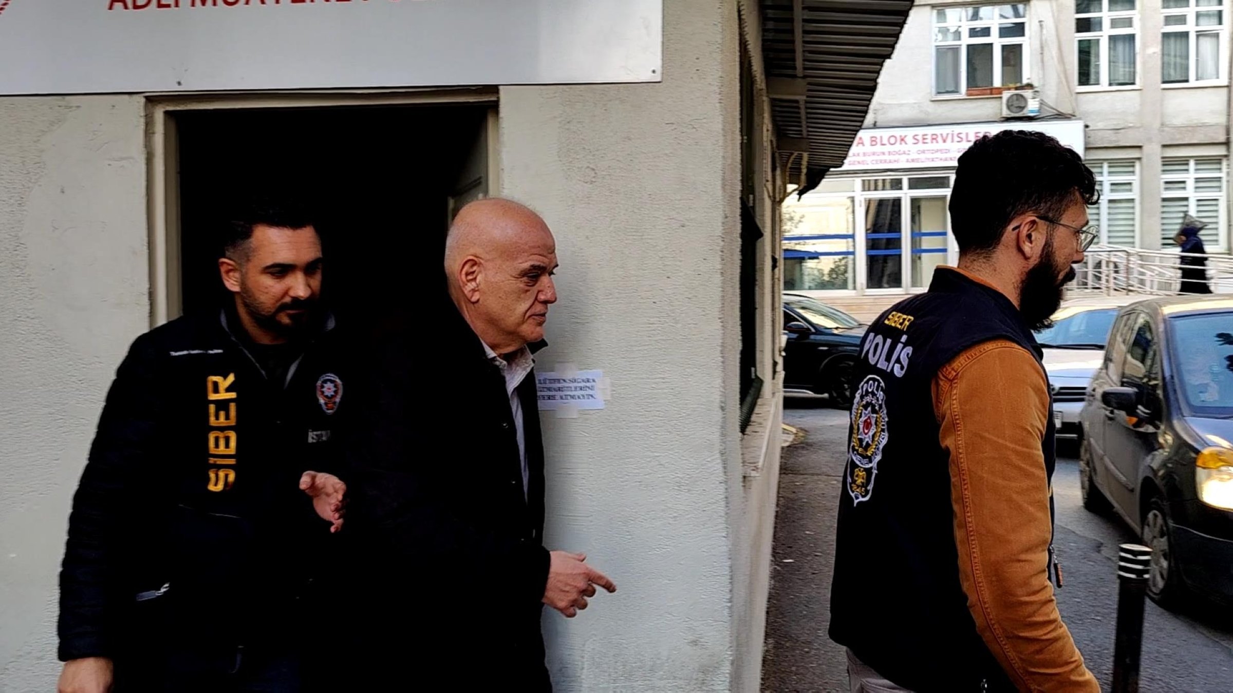 Ahmet Çakar (C) leaves the Istanbul Chief Public Prosecutor’s Office after giving a statement amid the TFF betting scandal, Istanbul, Türkiye, Dec. 12, 2025. (DHA Photo)