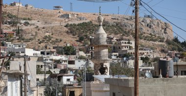 A damaged mosque minaret is seen in the town of Beit Jinn, where the Damascus Countryside Health Directorate reported that 13 people were killed in an attack, while the Israeli army said it carried out a military operation in the town, resulting in the injury of six soldiers in rural Damascus near Mount Hermon, Syria, Nov. 28, 2025. (EPA Photo)