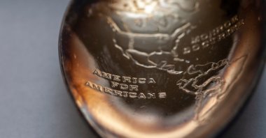 Tarnished Wm. Rogers silver plate Americana spoon commemorating the Monroe Doctrine with the inscription "America For Americans," New York, U.S. Feb. 6, 2023. (Shutterstock Photo)