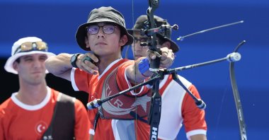 Turkey's Mete Gazoz shoots during the men's team quarterfinals Archery competition against India at the 2024 Summer Olympics, Paris, France, July 29, 2024. (AP Photo)