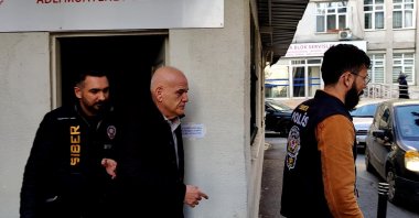 Ahmet Çakar (C) leaves the Istanbul Chief Public Prosecutor’s Office after giving a statement amid the TFF betting scandal, Istanbul, Türkiye, Dec. 12, 2025. (DHA Photo)
