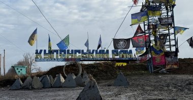 A road sign reads "Kupiansk region," near the frontline town of Kupiansk, Ukraine, Dec. 12, 2025. (Reuters Photo)
