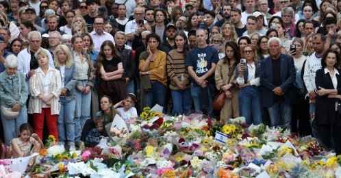 People pay tribute at Bondi Beach during a vigil to honor the victims of a mass shooting that targeted a Jewish holiday celebration on Sunday at Bondi Beach, in Sydney, Australia, Dec. 16, 2025. (Reuters Photo)
