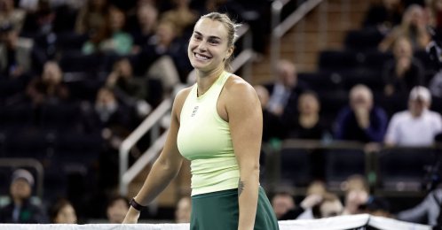 Belarus' Aryna Sabalenka reacts playing with U.S.' Tommy Paul against Japan's Naomi Osaka and Australia's Nick Kyrgios in a mixed doubles match during the Garden Cup at Madison Square Garden, New York City, U.S., Dec. 8, 2025. (AFP Photo)