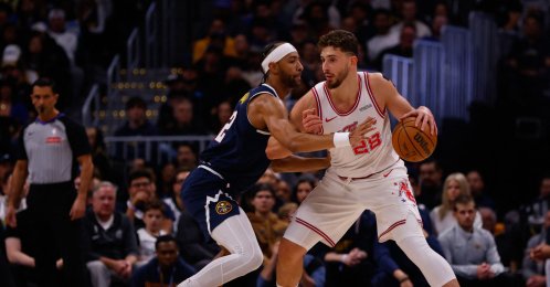 Houston's Alperen Şengün (R) dribbles against Denver Nuggets' Zeke Nnaji during the first quarter at Ball Arena, Denver, Colorado, Dec. 15, 2025. (AFP Photo)
