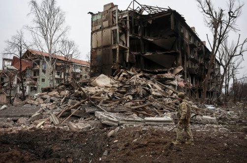 A Ukrainian police officer checks an area for residents in the front line town of Dobropillia, Donetsk region, Ukraine, Dec. 9, 2025. (Reuters Photo)