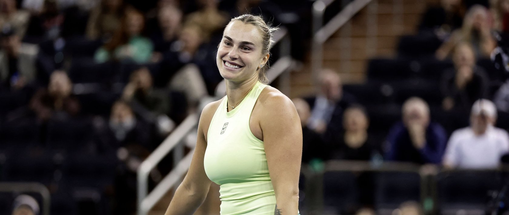 Belarus' Aryna Sabalenka reacts playing with U.S.' Tommy Paul against Japan's Naomi Osaka and Australia's Nick Kyrgios in a mixed doubles match during the Garden Cup at Madison Square Garden, New York City, U.S., Dec. 8, 2025. (AFP Photo)