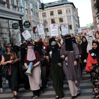 Thousands of people protest in defiance of the Danish Governments ban on the burka and niqab in Aarhus, Denmark, Aug. 1, 2018. (Getty Images Photo)