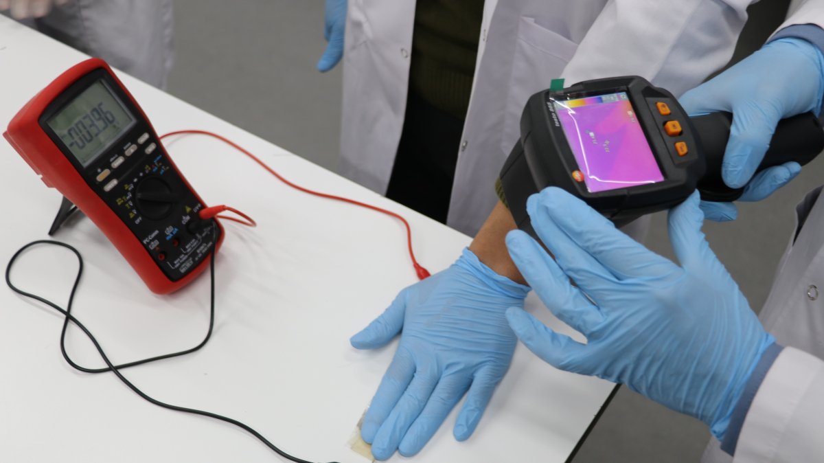 A researcher tests a locally developed device that converts waste heat into electrical energy at Sivas University of Science and Technology, Sivas, eastern Türkiye, Dec. 17, 2025. (IHA Photo)