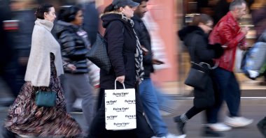 Shoppers walk on Oxford Street, London, Britain, Nov. 21, 2025. (EPA Photo)