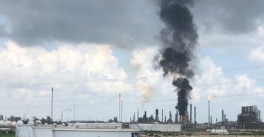 Smoke rises from a fire at Exxon Mobil's refining and chemical plant complex in Baytown, near Houston, Texas, U.S. July 31, 2019. (Reuters Photo)