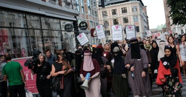 Thousands of people protest in defiance of the Danish Governments ban on the burka and niqab in Aarhus, Denmark, Aug. 1, 2018. (Getty Images Photo)