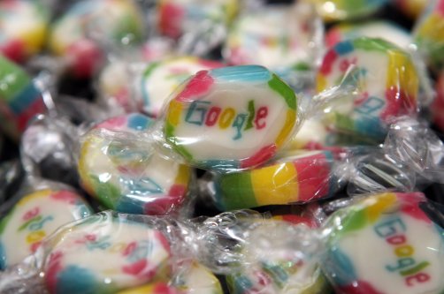 Pieces of candy featuring the Google logo are seen at the official opening of Google’s offices in Berlin, Germany, Sept. 26, 2012. (Getty Images Photo)