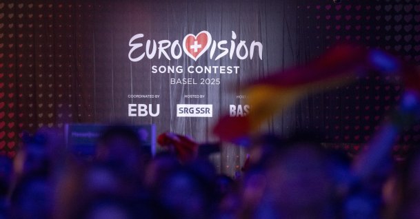 People watch a broadcast in the Eurovision Village during the grand final of the 69th Eurovision Song Contest (ESC), Basel, Switzerland, May 17, 2025. (EPA Photo)