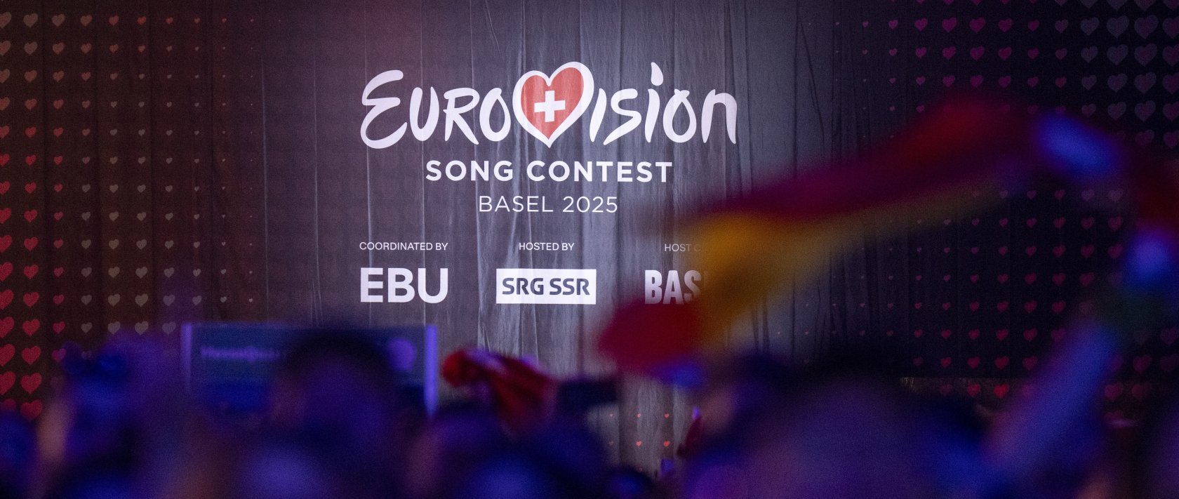 People watch a broadcast in the Eurovision Village during the grand final of the 69th Eurovision Song Contest (ESC), Basel, Switzerland, May 17, 2025. (EPA Photo)