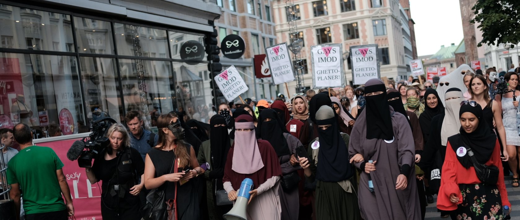 Thousands of people protest in defiance of the Danish Governments ban on the burka and niqab in Aarhus, Denmark, Aug. 1, 2018. (Getty Images Photo)