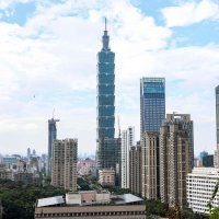 The Taipei 101 building is seen among residential and commercial buildings in Taipei, Dec. 18, 2025. (AFP Photo)
