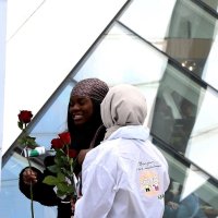 Young Muslims present roses and informative pamphlets to people in Belgium, April 13, 2019. (AA File Photo)