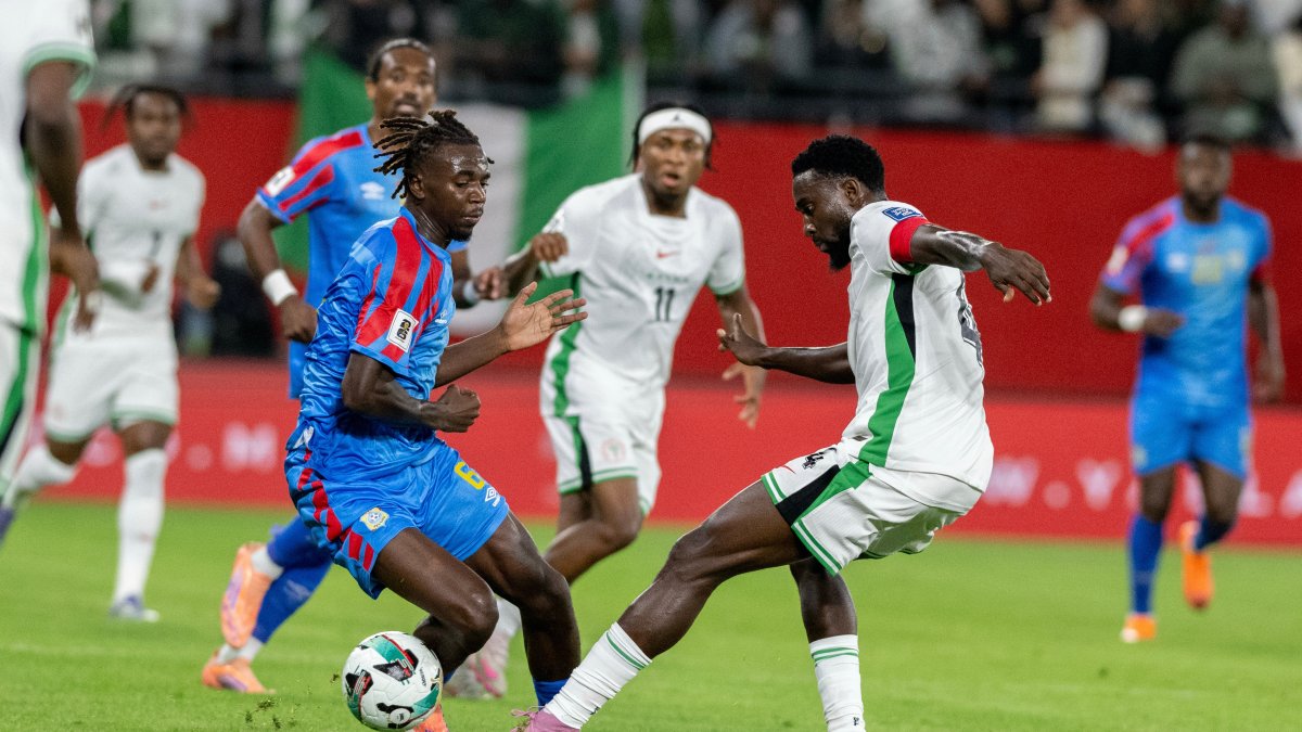 Congo's Ngal'ayel Mukau challenges Nigeria's Wilfred Ndidi during the World Cup African qualifier match between Congo and Nigeria, Rabat, Morocco, Nov. 16, 2025. (AP Photo)