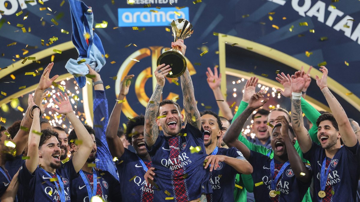 PSG's players celebrate on the podium after winning the 2025 FIFA Intercontinental Cup final football match between Paris Saint-Germain (PSG) and CR Flamengo at the Ahmad bin Ali Stadium, Al-Rayyan, Qatar, Dec. 17, 2025. (AFP Photo)