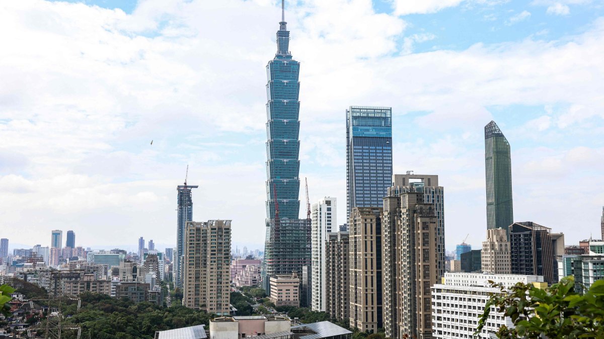 The Taipei 101 building is seen among residential and commercial buildings in Taipei, Dec. 18, 2025. (AFP Photo)