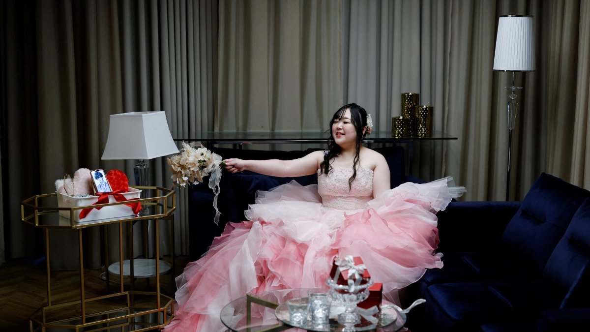 Virtual groom, real wedding: AI romance blooms in Japan