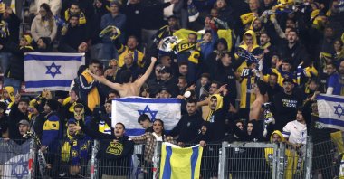 Maccabi Tel Aviv fans display Israel flags in the stands during the UEFA Europa League match against VfB Stuttgart at MHPArena, Stuttgart, Germany, Dec. 11, 2025. (Reuters Photo)