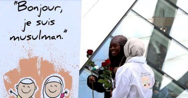Young Muslims present roses and informative pamphlets to people in Belgium, April 13, 2019. (AA File Photo)