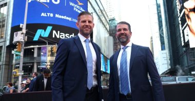 Eric Trump (L), newly appointed ALT5 Board Director, and ALT5 Board Observer Donald Trump Jr. pose outside Nasdaq in Times Square in New York, U.S., Aug. 13, 2025. (AFP Photo)