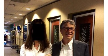 Bill Gates appears with a woman, who's identity has been obscured, in this image from the Epstein estate released by House Oversight Committee Democrats in Washington, D.C., U.S., Dec. 18, 2025. (House Oversight Committee Democrats/Handout via Reuters)
