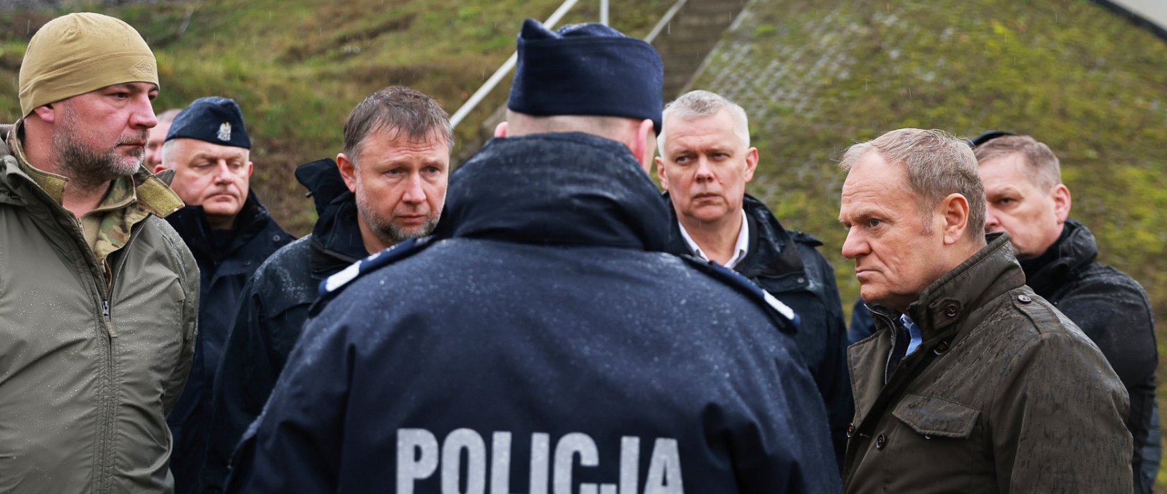 Polish Prime Minister Donald Tusk (R) visits a sabotaged rail line near Mika, Poland, Nov. 17, 2025. (AP Photo)