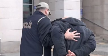 A Turkish police officer detains a Daesh suspect, Ankara, Türkiye, Dec. 19, 2025. (DHA Photo)