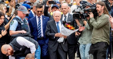 Former Australian Prime Minister John Howard visits a floral memorial in honor of the victims of the mass shooting targeting a Hanukkah celebration on Sunday, at Bondi Beach, Sydney, Australia, Dec. 16, 2025. (Reuters Photo)