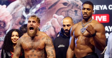 Jake Paul (L) and Anthony Joshua during the weigh-in at The Fillmore, Miami Beach, Florida, U.S., Dec. 18, 2025. (Reuters Photo)