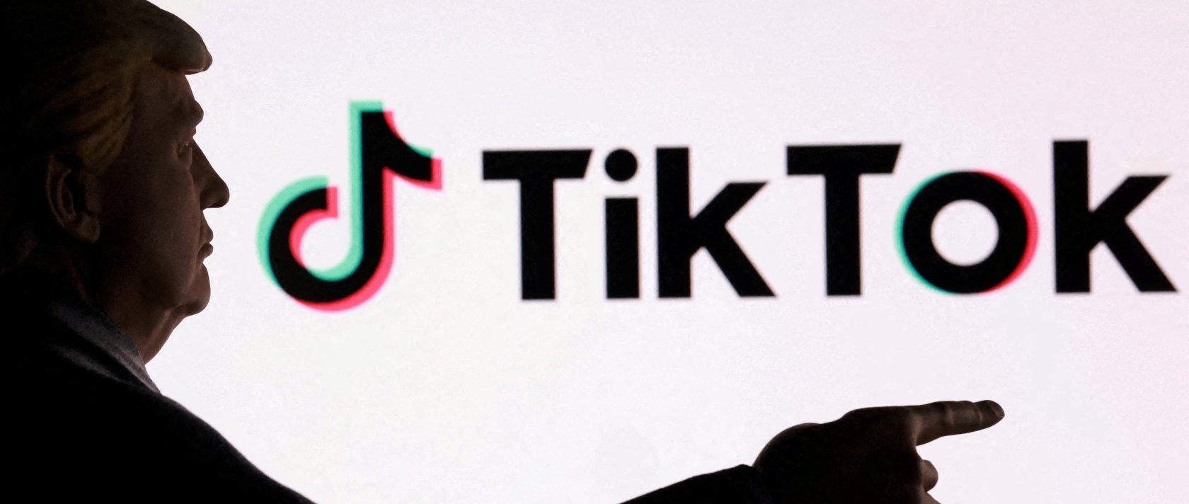 A 3D-printed miniature model depicting U.S. President Donald Trump in front of the TikTok logo is shown in this illustration taken Sept. 24, 2025. (Reuters Photo)