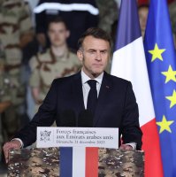 France's President Emmanuel Macron addresses French troops during a ceremony at the 5th Cuirassier Regiment's base in Zayed Military City, near Abu Dhabi, United Arab Emirates (UAE), Dec. 21, 2025. (AFP Photo)