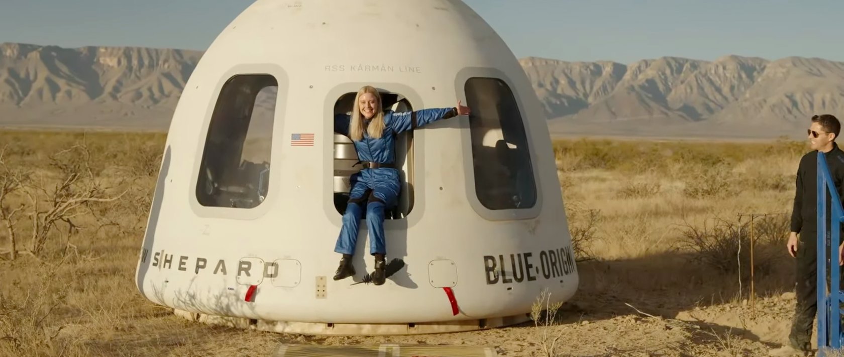 This image provided by Blue Origin, Michaela Benthaus poses after the Blue Origin's capsule landed, West Texas, U.S., Dec. 20, 2025. (AP Photo)